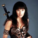 Lucy Lawless posando como Xena