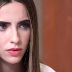 Foto de Andreia com expressão de raiva e decepção, Adriano com olhar de culpa e Verônica com expressão de tristeza.