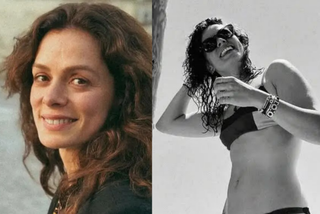 "Foto de Ozge Ozpirincci posando de biquíni em uma praia na Turquia, sorrindo e exibindo boa forma."