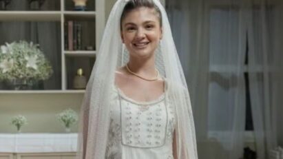 Alt text: Celeste vestida de noiva ao lado de Edu durante cerimônia tensa em Garota do Momento.