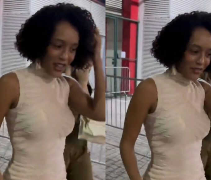 Imagem de Taís Araújo com novo visual como Raquel em Vale Tudo, usando penteado elegante e roupa de alfaiataria.