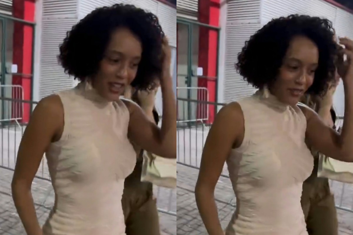 Imagem de Taís Araújo com novo visual como Raquel em Vale Tudo, usando penteado elegante e roupa de alfaiataria.