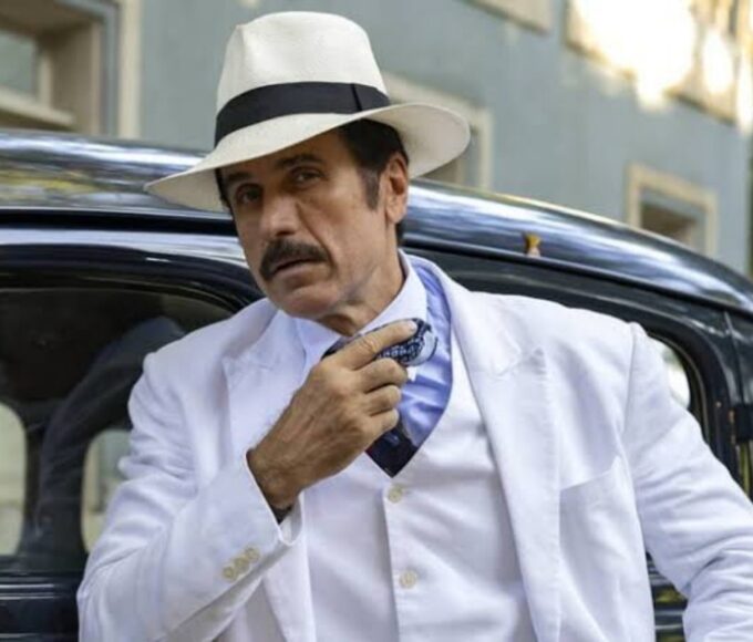 Ernesto descobre que o bebê de Zulma é filho de Candinho em cena marcante da novela Êta Mundo Melhor! da Globo