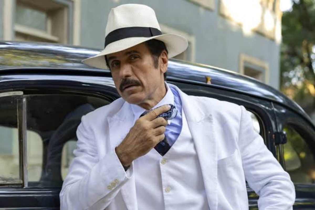 Ernesto descobre que o bebê de Zulma é filho de Candinho em cena marcante da novela Êta Mundo Melhor! da Globo