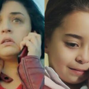 Melek atendendo o telefone com lágrimas nos olhos