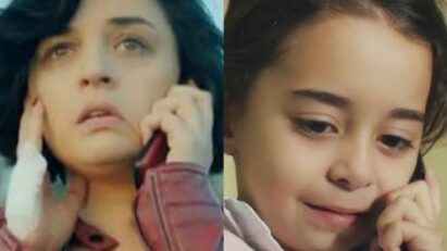 Melek atendendo o telefone com lágrimas nos olhos