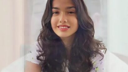 Retrato da atriz turca Kubra Süsun, conhecida por interpretar Nisan em “Força de Mulher”, com expressão doce e olhar marcante.