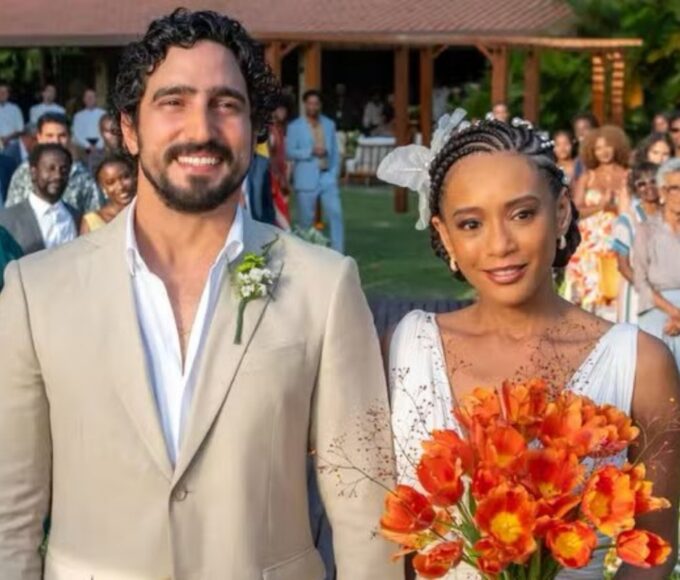 Raquel e Ivan trocando alianças em cerimônia emocionante de Vale Tudo”