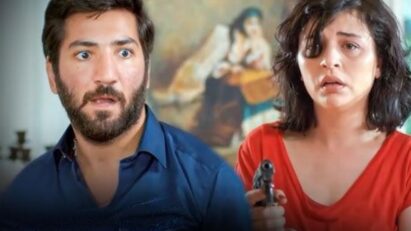 “Şule aponta a arma para Cengiz durante confronto decisivo em Mãe, novela da Record.”