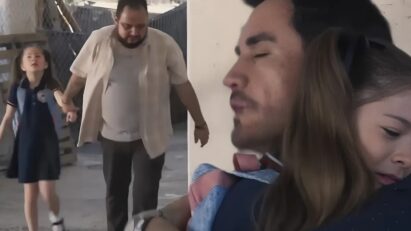 Cena de Azul caminhando com um homem desconhecido na capital, após se perder.”